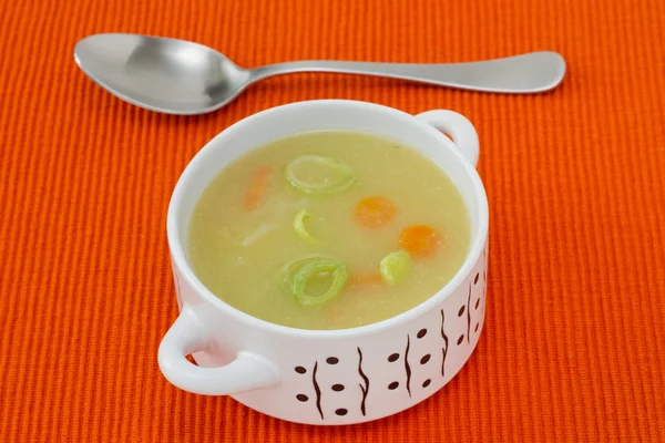 Leek soup in the white bowl — Stock Photo, Image