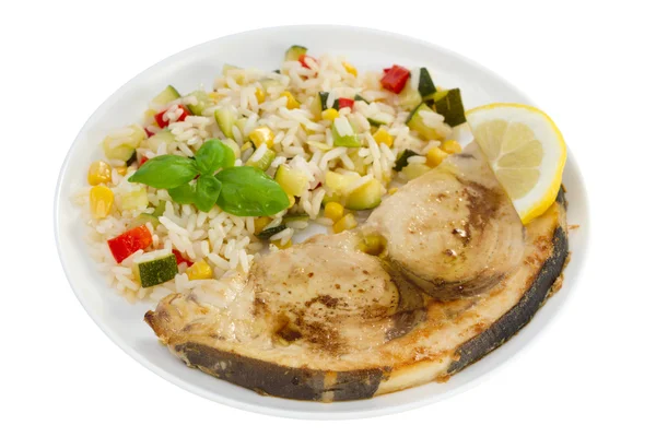 Fried swordfish with rice with vegetables — Stock Photo, Image