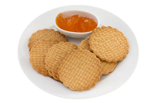 Biscotti con marmellata di albicocche sul piatto bianco — Foto Stock