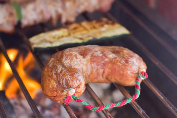 Sausage barbecue with fire — Stock Photo, Image