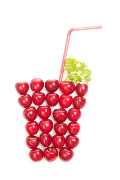 Cherries in the shape of a glass of juice — Stock Photo, Image