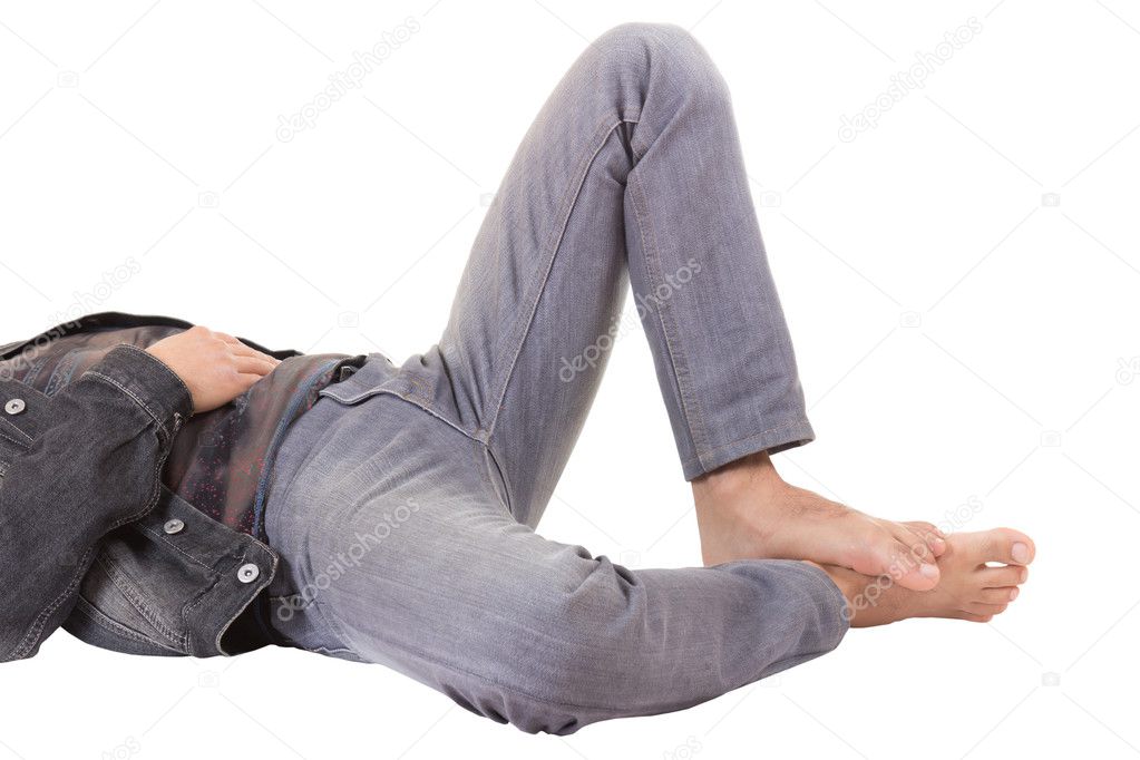 Legs of man lying on the floor, isolated on white