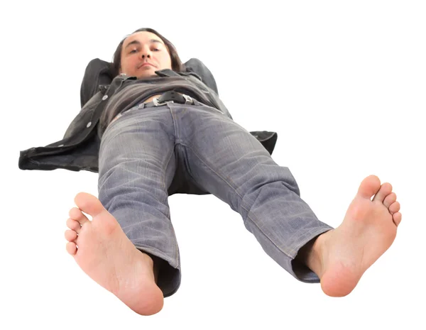 Περιστασιακή άνθρωπος χαλαρωτικό, εστίαση στα πόδια του — Φωτογραφία Αρχείου