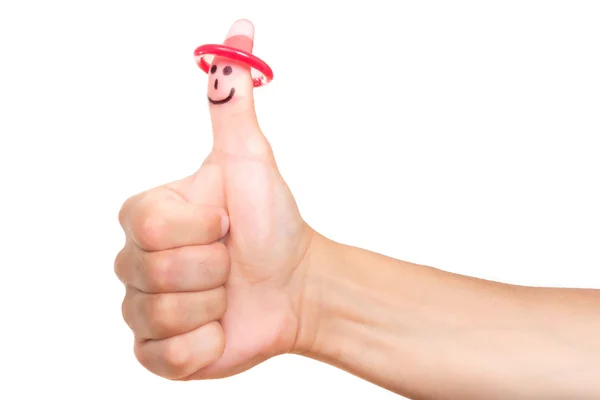 Preservativo no polegar sorridente, isolado em branco — Fotografia de Stock