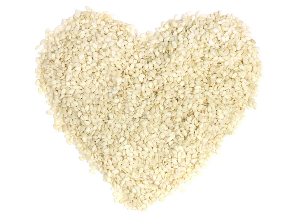 Sesame seeds in shape of heart — Stock Photo, Image