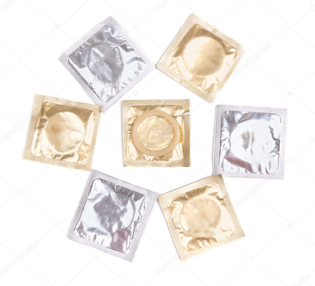 Condoms on white background