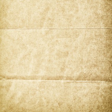 Folded grungy stained old paper clipart