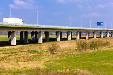 Under the highway. Urban scene clipart