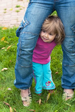 Girl hides for mother clipart