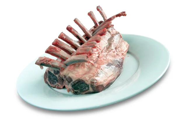 Rack of lamb on a white plate — Stock Photo, Image