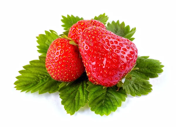 Whole strawberry and leaves — Stock Photo, Image