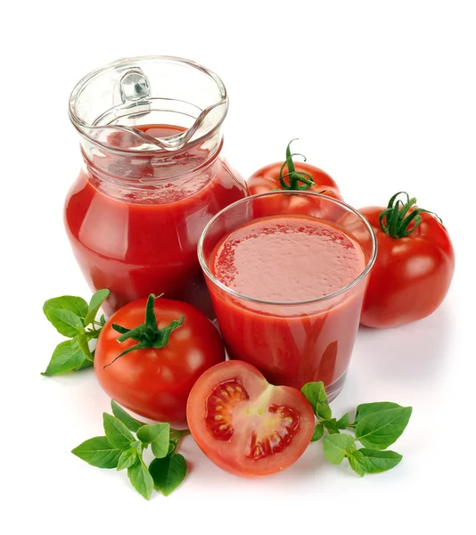 Jug, glass of tomato juice and fruit — Stock Photo, Image