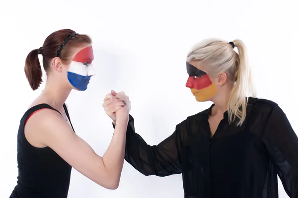 stock image Football soccer fans arm wrestling