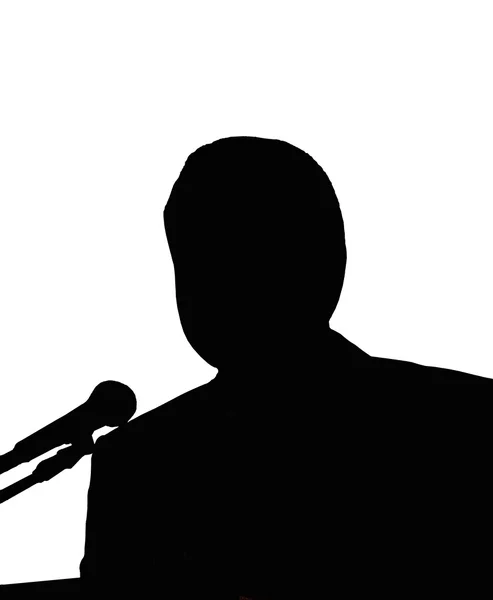 Silhouette dell'uomo con microfono — Foto Stock