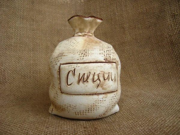 Bolsa de cerámica sobre fondo marrón — Foto de Stock