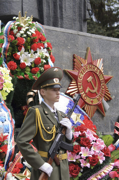 On post beside eternal flame