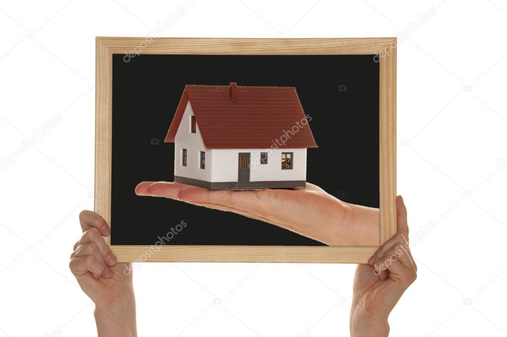 Hand and house