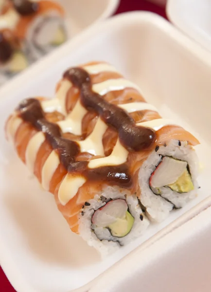 Sushi in a take-away container — Stock Photo, Image