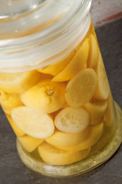 Lemons laid into jar clipart