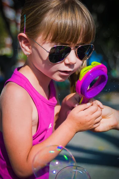 Girl and soap bubbles — Stock Photo, Image