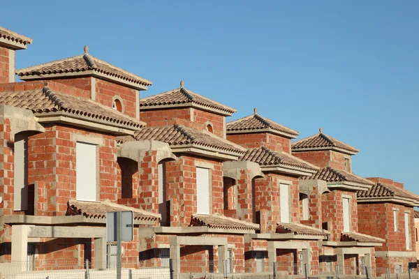 Row of almost finished residential buildings — Stock Photo, Image