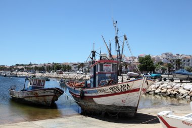 Old fishing boats in Lagos, Algarve Portugal clipart