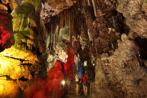 Illuminated stalactites inside of the St. Michaels Cave of Gibraltar — Stock Photo, Image