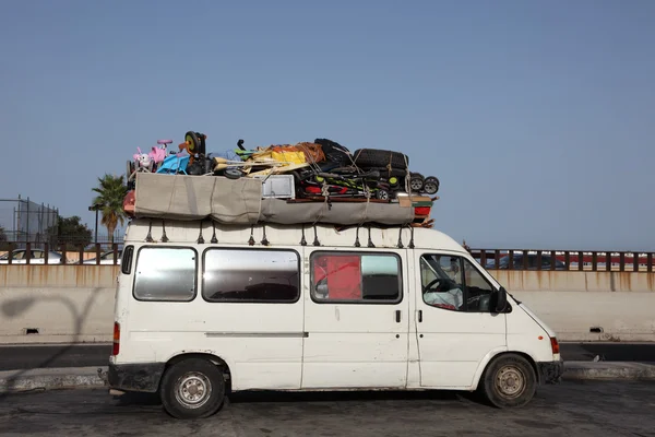 Overloaded van heading to Morocco — Stock Photo, Image