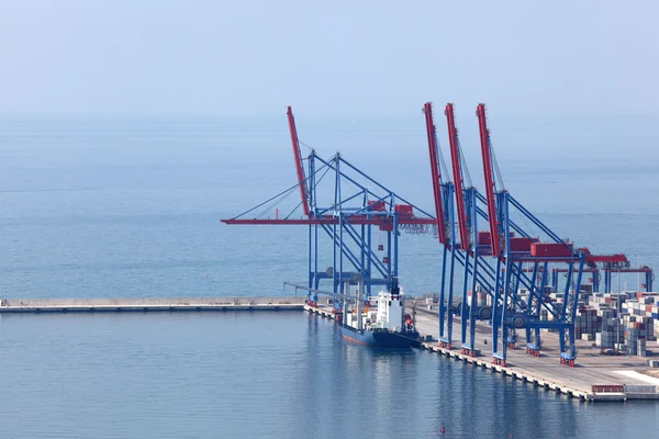 Cranes in container terminal of industrial port — Stock Photo, Image