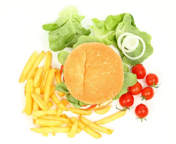Fresh hamburger with french fries, salad and tomatoes — Stock Photo, Image