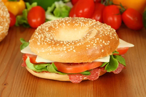 Fresh bagle sandwich with salami — Stock Photo, Image
