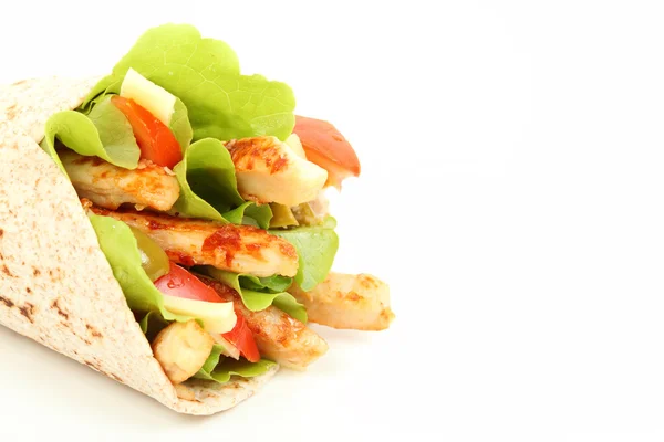 Wholemeal tortilla wrap with chicken stripes and lettuce — Stock Photo, Image
