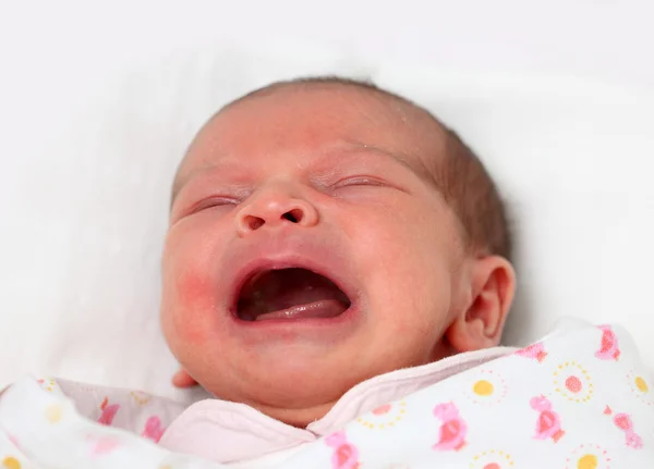 Portrait of a newborn baby girl crying — Stock Photo, Image