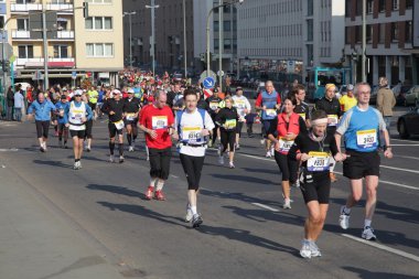 Runners in city street during the Frankfurt Marathon 2010 in Germany clipart