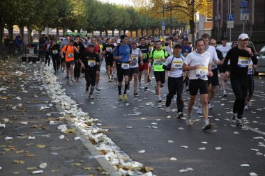 Runners on the street during the Frankfurt Marathon 2010 in Germany clipart