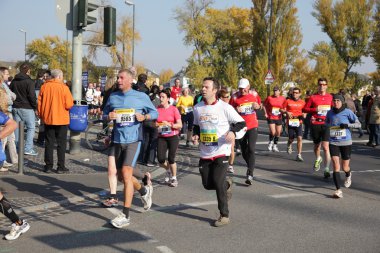 Runners on the street during the Frankfurt Marathon 2010 in Germany clipart