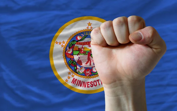 Uns staatliche Flagge von Minnesota mit harter Faust davor symboli — Stockfoto