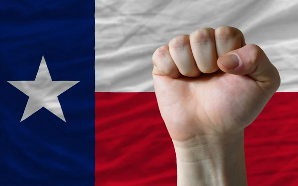Nós bandeira do estado do Texas com punho duro na frente dele simbolizando — Fotografia de Stock