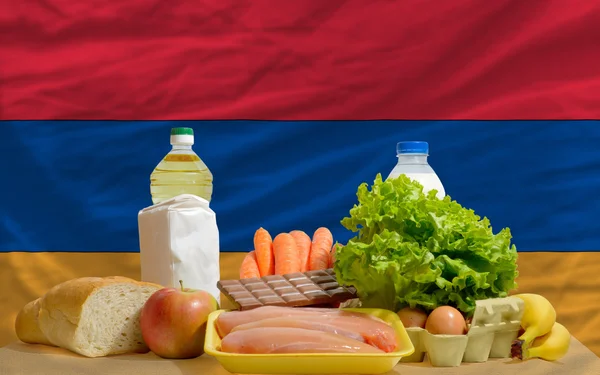 アルメニアの国旗の前で基本的な食糧食料品 — ストック写真