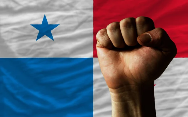 Punho duro na frente da bandeira do Panamá simbolizando o poder — Fotografia de Stock