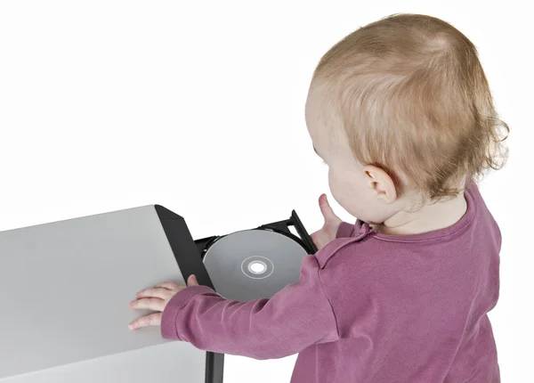 Kleinkind spielt mit CD — Stockfoto