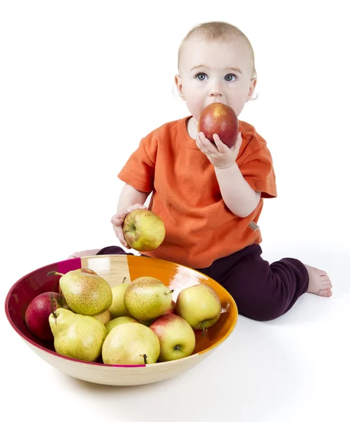 Baby med äpplen — Stockfoto