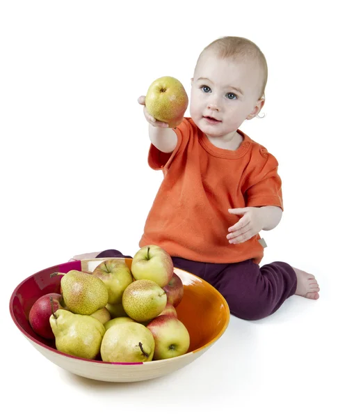 Baby med äpplen — Stockfoto
