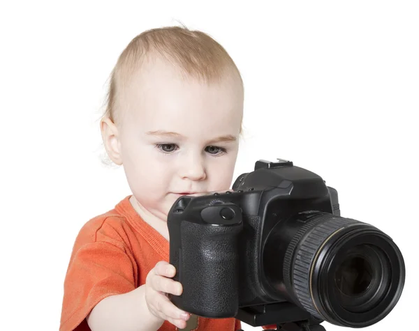 Jeune enfant avec appareil photo numérique — Photo