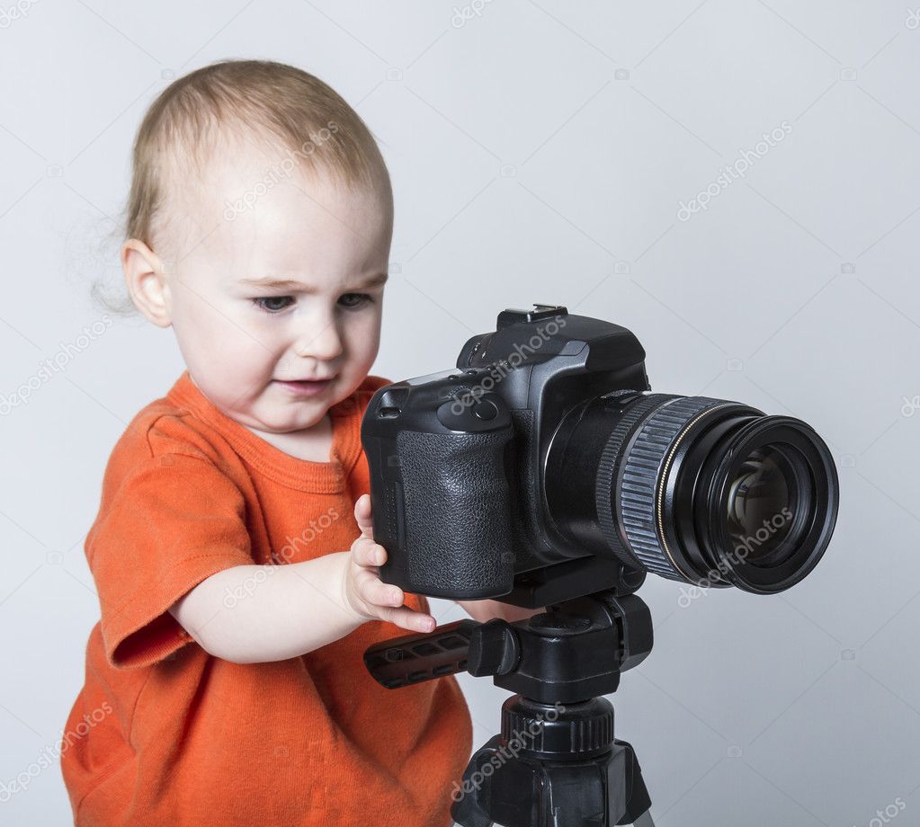 Young child with digital camera — Stock Photo © gewoldi #11294998