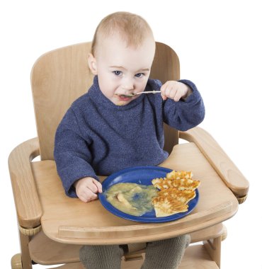 Young child eating in high chair clipart