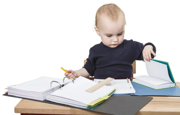 Young child at writing desk — Stock Photo, Image