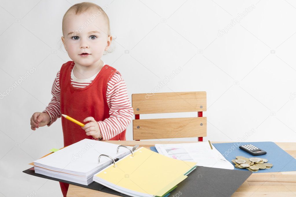 Young child at writing desk