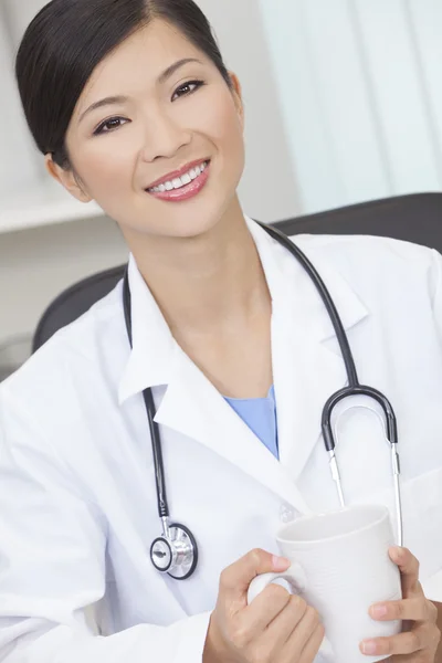 stock image Chinese Female Woman Doctor Drinking Coffee or Tea