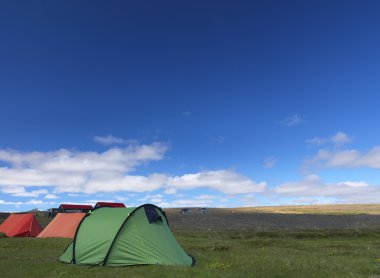 Camping tents in the field clipart